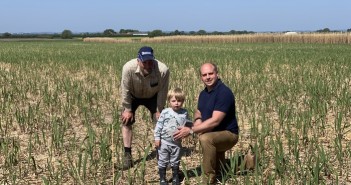 Miscanthus delivers ecological benefits Rob Meadley, his father and son on Miscanthus field early June 2020